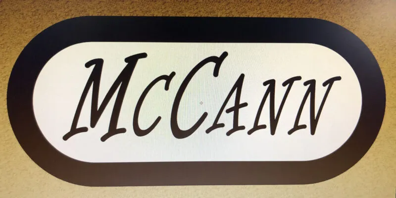 sign cutout with mccann name